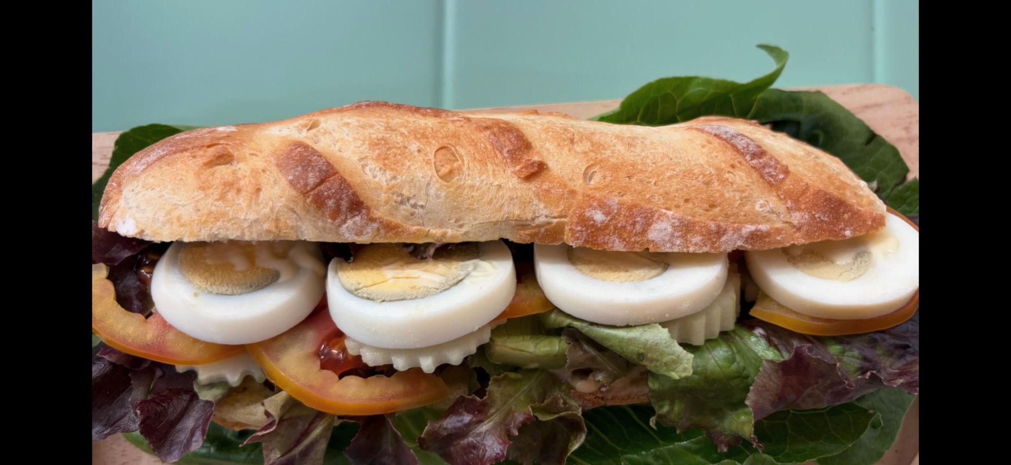 Vegetables Sandwich · fresh baguette with cheese, tomato and salad